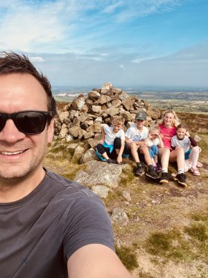 Laura and her family enjoying a hill walk after recovery from acoustic neuroma surgery.
